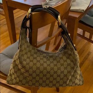 Very well loved Gucci bag.